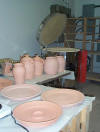 Bisque pots waiting on the table.